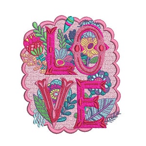 May include: Embroidered design of the word "LOVE" in pink with colorful floral accents and a scalloped border.