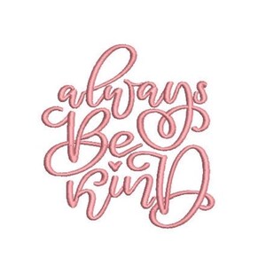 May include: An embroidery design featuring the text always be kind in a light pink thread color. The lettering is rendered in a cursive script font with a small heart icon positioned between the words be and kind on a plain white background.
