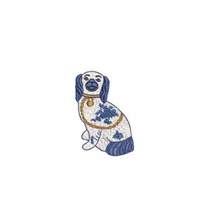 May include: A white porcelain dog figurine with blue and gold accents. The dog is sitting with its head tilted up and its tail curled around its legs.