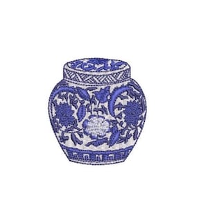 May include: An embroidered patch featuring a blue and white ginger jar design. The jar displays intricate floral patterns, a decorative lid, and a geometric border at the base, all rendered in detailed blue thread against a white background.