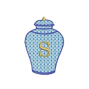 May include: A blue and white ceramic ginger jar with a gold lid and the letter "S" in gold on the front.