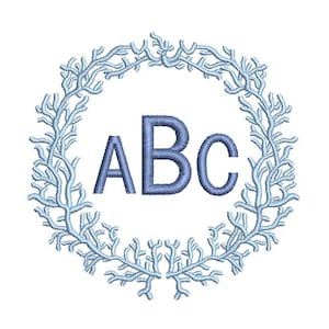 May include: A blue monogram with the letters ABC in a wreath of light blue coral branches.
