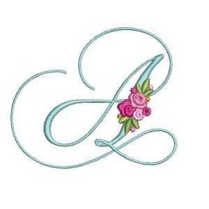 May include: An embroidered script letter L in light blue thread with a decorative cluster of pink roses and green leaves attached to the center of the letter. The design features a classic cursive font style with elegant, sweeping curves.