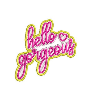 Peut inclure: Patch brodé rose et jaune avec le texte "hello gorgeous" et un petit cœur.