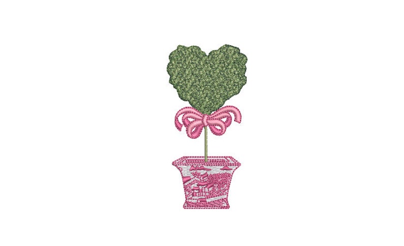 May include: A heart-shaped topiary tree with a pink bow tied around the trunk, potted in a pink and white patterned planter.