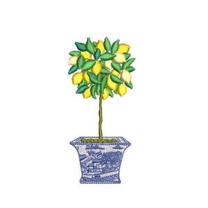 May include: An embroidery design of a lemon tree with bright yellow lemons and green leaves, featuring a thin brown trunk. The tree is planted in a square, blue and white patterned planter with a detailed landscape illustration on its exterior.