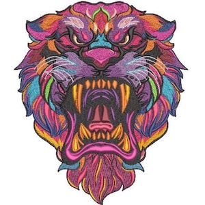 May include: An embroidered patch featuring a stylized lion head with an open mouth and bared teeth. The design uses vibrant, multi-colored thread including shades of magenta, purple, orange, yellow, and cyan, creating a detailed, textured appearance.