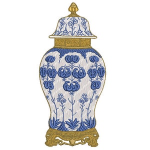 May include: A white porcelain ginger jar with a blue and gold floral design. The jar has a lid and a gold base.
