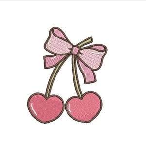 May include: An embroidered patch featuring two pink heart-shaped cherries with brown stems, topped with a light pink bow. The design has a dark brown outline and a textured stitch pattern throughout the pink heart shapes and the bow fabric.