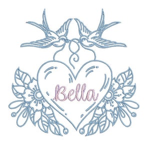 May include: Blue outline embroidery design of two birds facing each other with their wings spread, forming a heart shape with the text "Bella" inside. The heart is surrounded by floral designs.