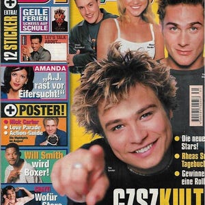 May include: A vintage Bravo magazine cover from July 1999 featuring multiple celebrities, including Tim Sander in the foreground pointing forward. The cover includes text such as GZSZKULT, Geile Ferien, and various headlines about stars like Will Smith and Nick Carter.