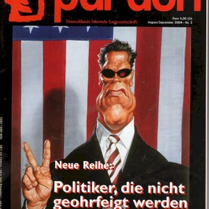 Puede incluir: La edición de agosto/septiembre de 2004 de la revista Pardon presenta una caricatura de Arnold Schwarzenegger con gafas de sol oscuras y traje frente a una bandera estadounidense. El texto dice: Boykottiert von Gerhard Schröder, Neue Reihe: Politiker, die nicht geohrfeigt werden.