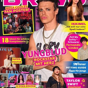 Op de afbeelding: Een tijdschriftcover met het woord "BRAVO" in roze. De cover toont Yungblud, met tekst als "MEGA COOLES FAN-POSTER!" en "ROCKSTAR MIT HERZ". Andere beroemdheden staan ook op de cover.