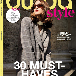 Könnte beinhalten: Die November-Ausgabe 2024 des Magazins Burda Style zeigt ein Cover mit dem Text 30 MUST-HAVES, NÄHEN AUS LEIDENSCHAFT und COOLER KONTRAST. Eine Person trägt einen grauen karierten Blazer mit weißem Kragen und brauner Sonnenbrille vor einer Säule.