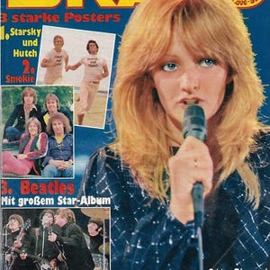Könnte beinhalten: Ein Bravo-Magazin-Cover vom 20. April 1978 mit einer blonden Sängerin, die ein Mikrofon hält. Das Cover enthält Text, Schlagzeilen und kleine Fotoeinschübe von Starsky und Hutch, der Band Smokie und den Beatles auf dunkelblauem Hintergrund.