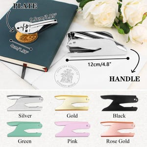 May include: A collection of metal and colored seal presses. The silver press is 4.8 inches long. Other colors include gold, black, green, pink, and rose gold. The plate is 3.85 inches long and the coin is 1.58 inches.