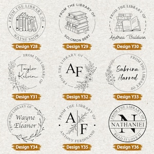 May include: A collection of nine personalized library stamps with various designs. Each stamp features the phrase "From the Library of" encircling a name or initials, along with a unique graphic of books or floral elements. Design numbers are included.
