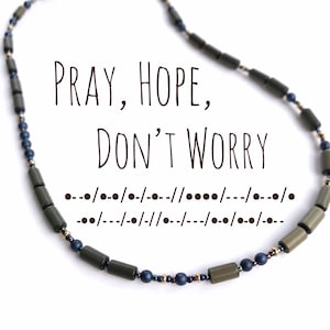 Pray Hope Don't Worry morse code necklace. Green and blue beads spell the Padre Pio quote