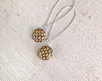 Honeycomb Earrings. Ceramic beads with hand-drawn pattern on hypoallergenic wires.