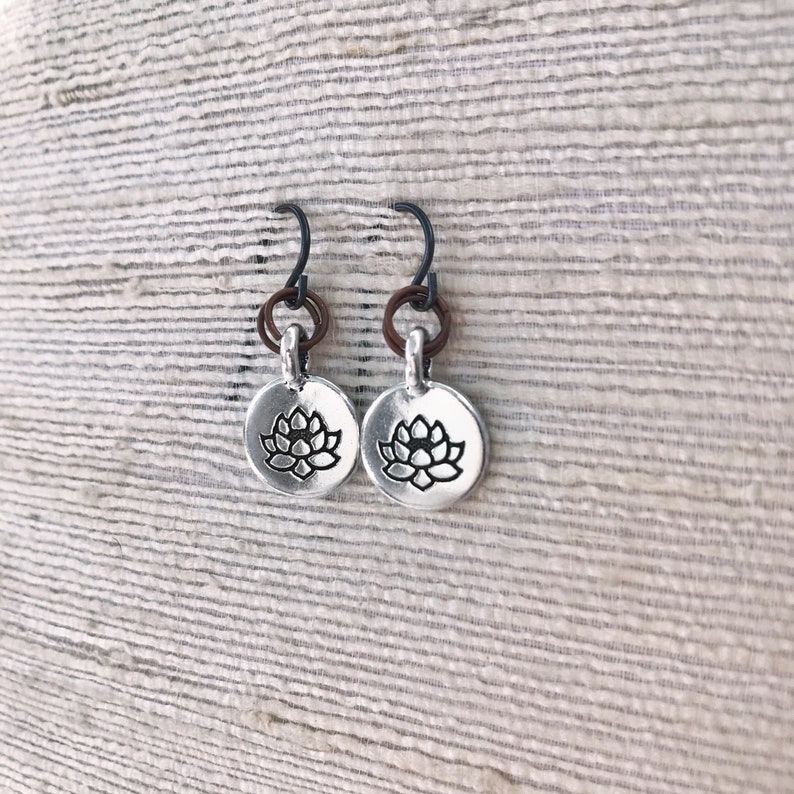 Lotus Flower earrings Silver plated pewter charms with black hypoallergenic ear wires and copper rings Earthy natural style Multitone metal