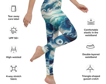 May include: Blue and white abstract print leggings with a high-waisted, double-layered waistband. The leggings feature a triangle-shaped gusset crotch and 4-way stretch fabric. The leggings also have a tear-away care label and UPF 50+ sun protection.