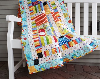 Silly Monsters Patchwork Quilt in Blue
