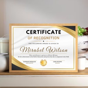 May include: A certificate of recognition with a gold border and black background. The certificate is given to Mirabel Wilson for her achievement in the field of education. The certificate is signed by Mannah Morales, Head Master, and Lars Peters, Mentor.