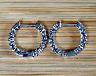 Moissanite huggies. A .45cttw pair of *true* huggy earrings, small yet solidly constructed, in sterling silver with 18k white gold plating!