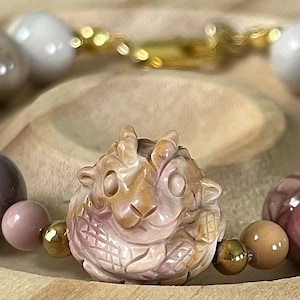 Alashan agate bracelet. The “Year of the Dragon II” bracelet with AAA semiprecious Alashan agates and hand-carved Alashan dragon hatchlings!
