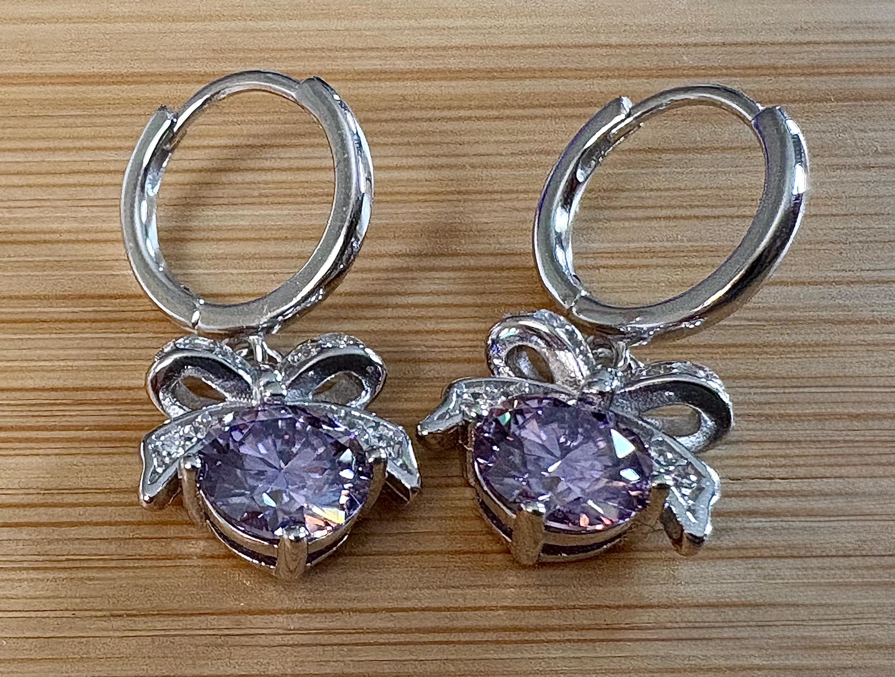 PURPLE Moissanite! A 2cttw certified pair of darling, delicate bow-tie huggy earrings with BEAUTIFUL vibrant purple Moissanite dangles!