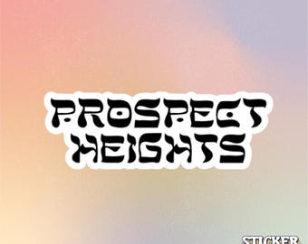 May include: A die-cut sticker featuring the black text PROSPECT HEIGHTS in a stylized, wavy font with a white border. In the bottom right corner, there is smaller text that reads STICKER KWEEN in a stacked, multi-colored outline font.