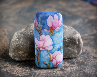 Magnolias on blue.  Polymer clay and resin Cabochon. Transferred image. Bead embroidery cabs. Lightweight. Made to Order. 1 x 2 inches.