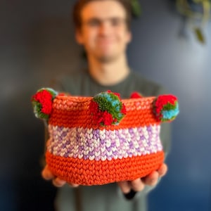 Handmade Crochet Basket with Vibrant Colours and Pom-Poms