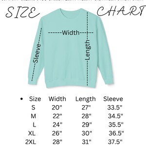 May include: Size chart for a unisex lightweight crewneck sweatshirt. The chart shows the width, length, and sleeve length in inches for sizes S through 3XL.