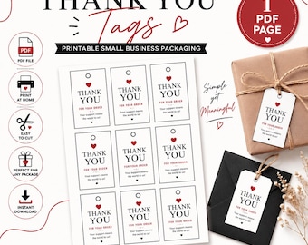May include: A printable PDF page featuring nine rectangular white tags with black text that reads THANK YOU FOR YOUR ORDER and Your support means the world to us, accented with small red hearts. Two tags are shown attached to gift packages.