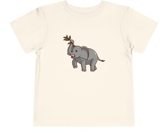 May include: A white t-shirt with a cartoon image of a gray elephant holding a green branch in its trunk.