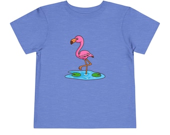 May include: A blue toddler t-shirt with a pink flamingo standing in a blue pond with green lily pads.