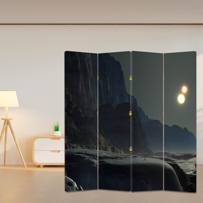 Dark sci fi landscape canvas room divider folding screen used as a privacy panel in a modern studio interior