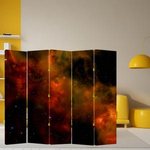 May include: A six-panel room divider featuring a vibrant nebula design. The artwork showcases fiery oranges, deep reds, and touches of green, with scattered stars against a dark background. The panels are connected by gold-colored hinges.