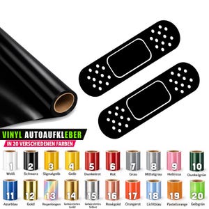 Peut inclure: Un rouleau de vinyle adhésif noir pour voiture avec un motif de pansement noir. L'image affiche également un nuancier avec 20 couleurs de vinyle différentes, dont le blanc, le noir, l'or et le rouge. Le texte indique "VINYL AUTOAUFKLEBER IN 20 VERSCHIEDENEN FARBEN."