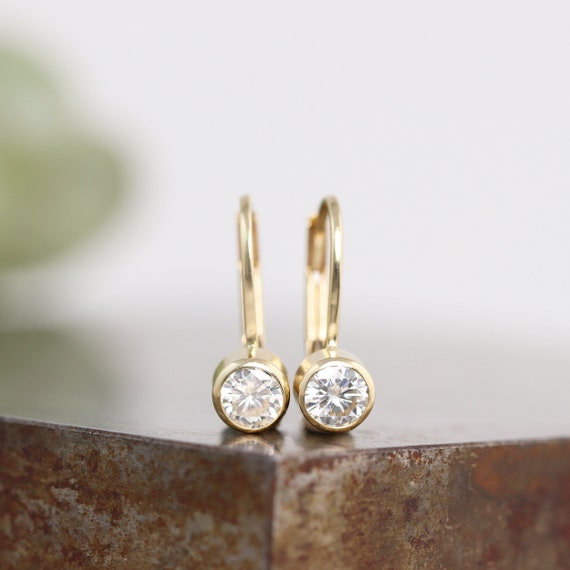 14k White Gold 4mm Round Ruby Bezel Set Earrings 14k White Gold 4mm Round Ruby Bezel Set Earrings