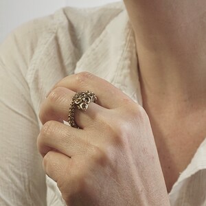 Octopus Tentacle Ring made of yellow brass.