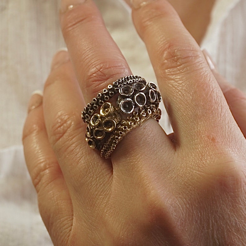 Octopus Tentacle Ring made of yellow brass.