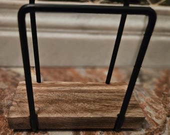 A decorative napkin holder.