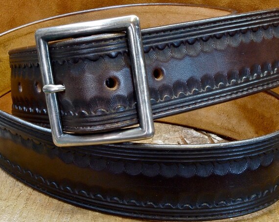 Brown leather belt : Hand Tooled Western border with Distressed buckle. Gun leather/ Cowboy style. Made in New York