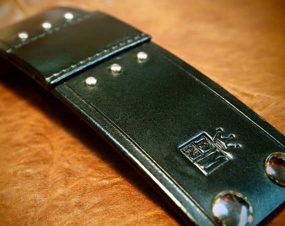Black leather cuff : Studded and Hand stitched using American bridle leather. Made in USA!
