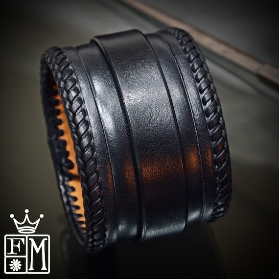 Black Leather Cuff bracelet: Fine craftsmanship- Tooled and laced with leather snaps! Hand made in New York!