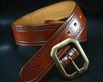 Light brown tooled and stamped leather belt! Made in New York USA