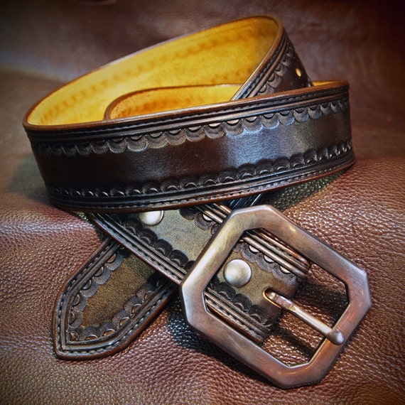 Brown leather belt : Tooled Western border with Distressed buckle 1-3/4" wide. Handmade in USA by Freddie Matara