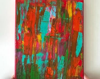 May include: Abstract acrylic painting on canvas with a red border. The artwork features vertical brushstrokes in vibrant colors, including red, orange, teal, green, yellow, and purple. The painting has a textured appearance.